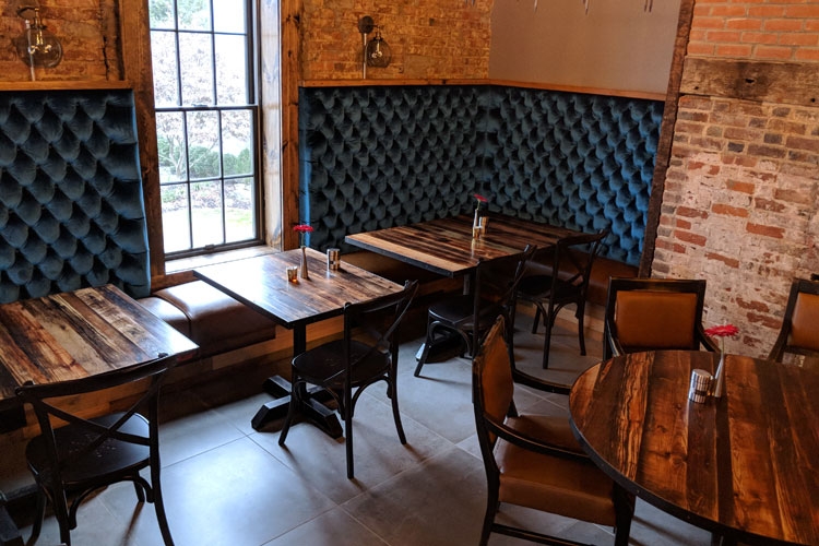 Upstairs Dining Room: Steel & barnwood tables, Custom banquettes with diamond tufting